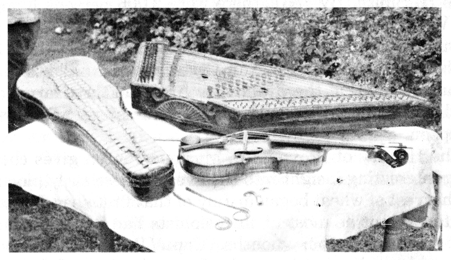 A photo of our Family fiddle and hammered dulcimer brought across western plains in a wagon.