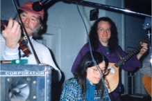 Ryan Thomson fiddling, along with Beverly Woods and Shan Aisenburg,  Holderness Contra Dance, New Hampshire