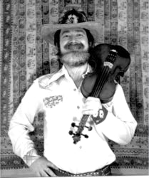 Captain Fiddle(Ryan Thomson) posed with his fiddle, Newmarket, New Hampshire