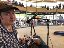 Brennish Thomson, about to fiddle inside of the Bear Cage, at Clark’s Bears, Lincoln, New Hampshire