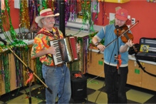 Fiddling Thomsons, Ryan and Brennish, perform at the New Hampshire Children’s Museum mardigras